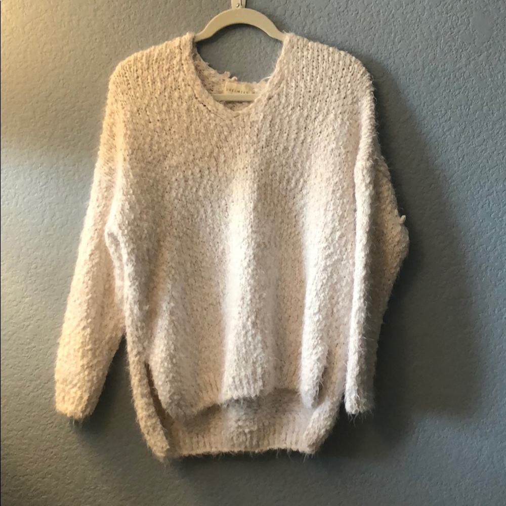 Soft white knitted sweater